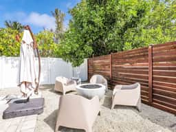 Tropical Haven- Heated Pool, Fire Pit, Fenced Yard