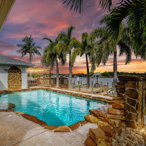 Palm Tree Retreat - Lakefront with Pool & Fire Pit - Image 1