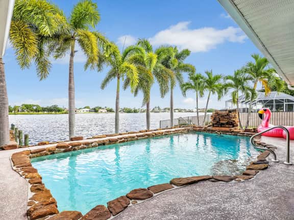Palm Tree Retreat - Lakefront with Pool & Fire Pit
