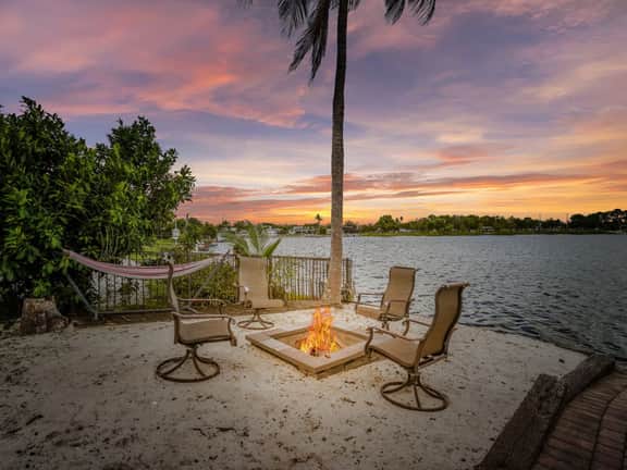 Palm Tree Retreat - Lakefront with Pool & Fire Pit