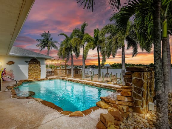 Palm Tree Retreat - Lakefront with Pool & Fire Pit